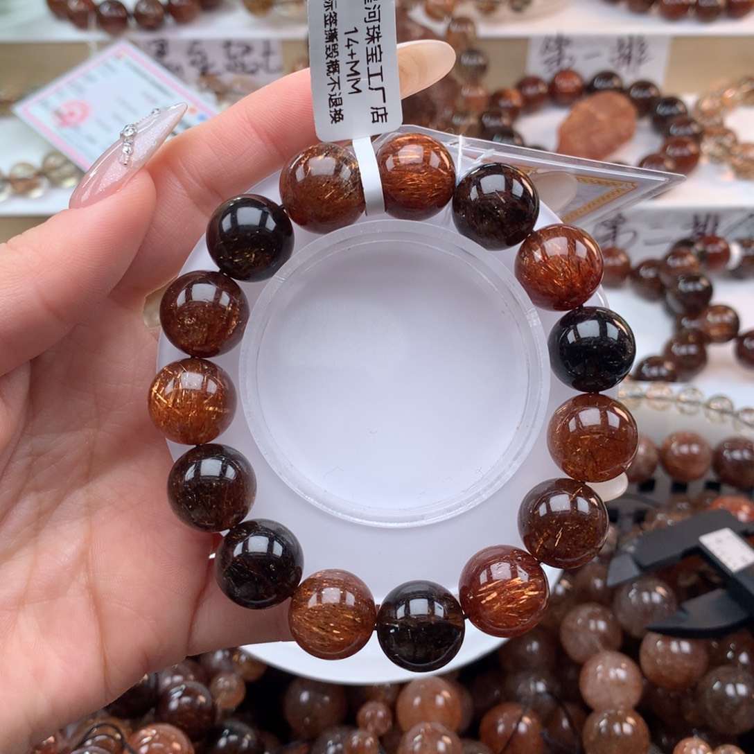 用***6水晶未镶嵌手串黑金超七多样性发其一