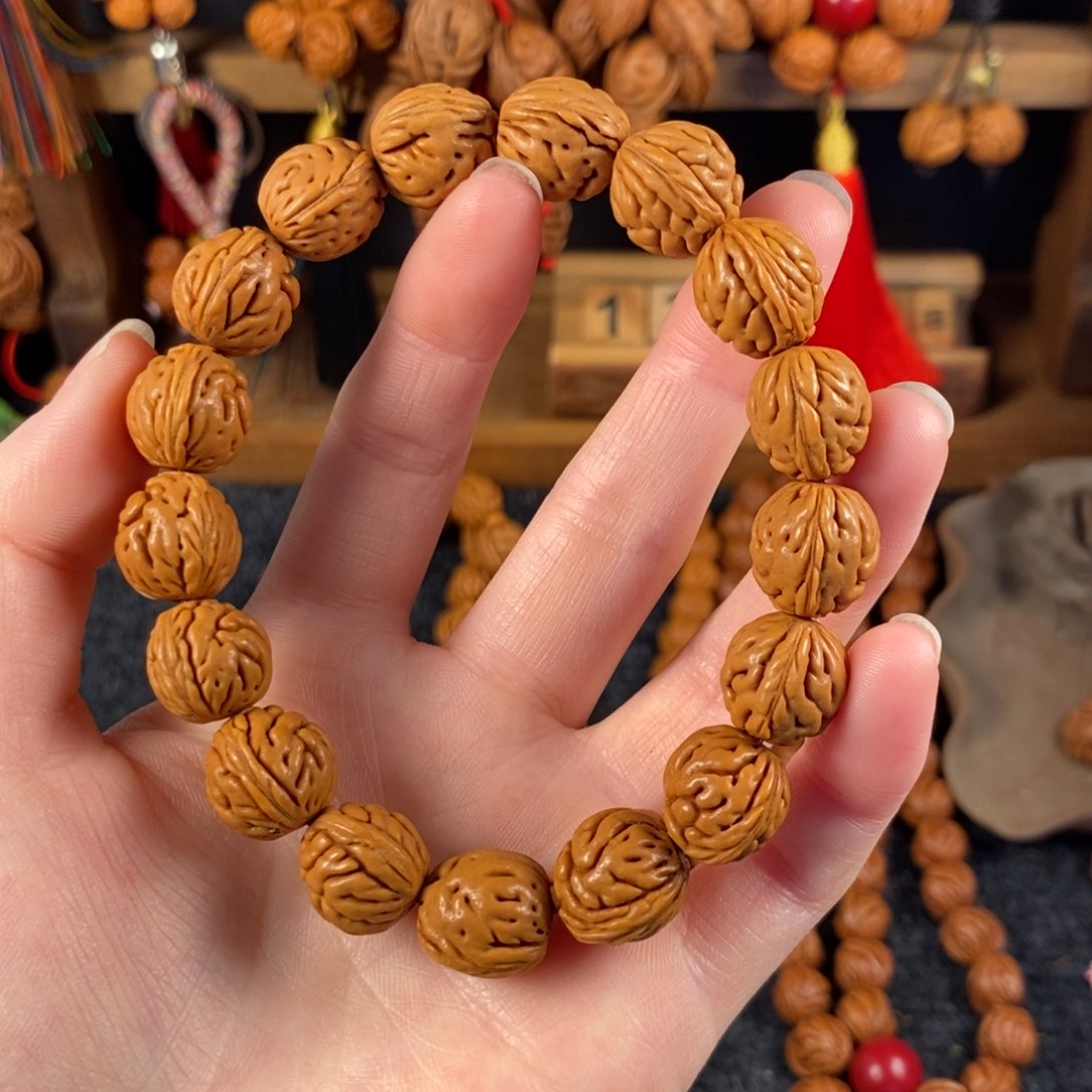 吊坠桃核桃枭手串