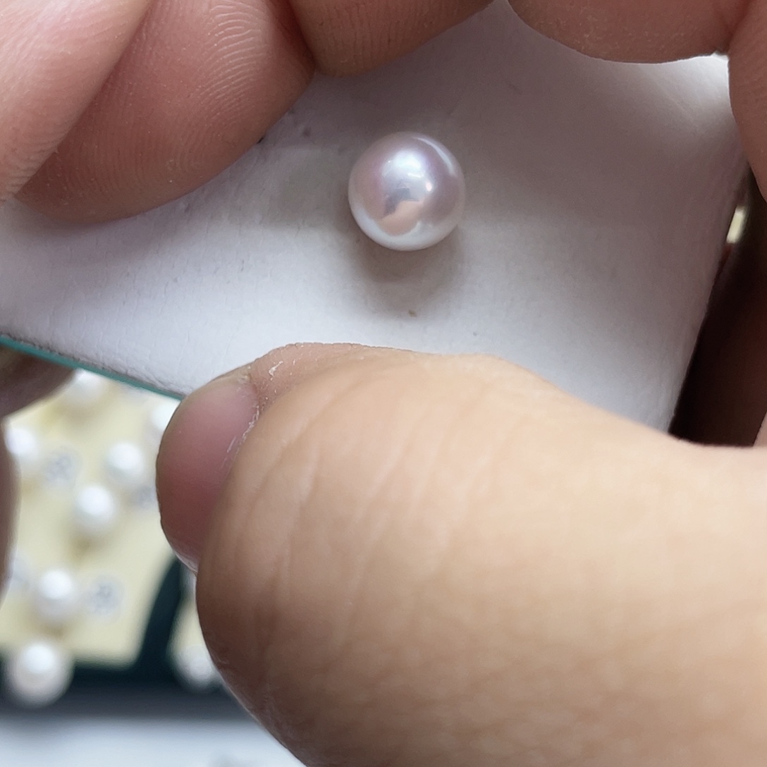 莫***可银S925镶嵌淡水珍珠耳饰