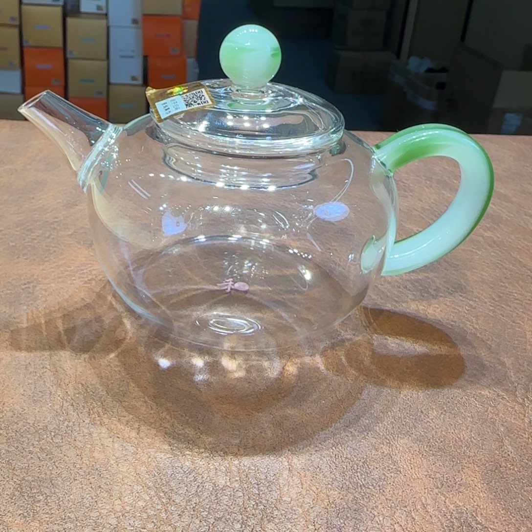 禾器简逸壶翠漪。 