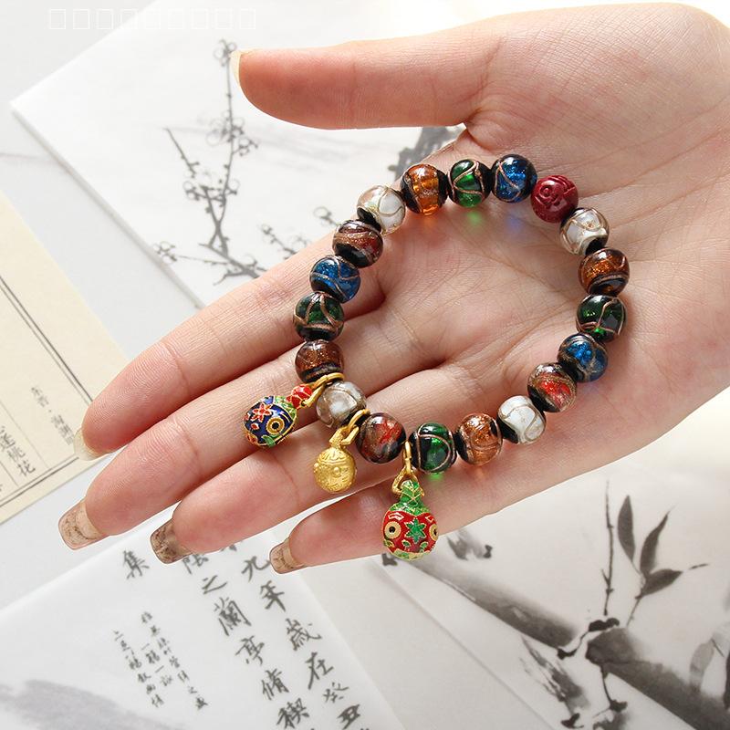 铜合金玻璃手链北京香灰琉璃手串古法吞金兽淄博多宝手链佛珠五彩