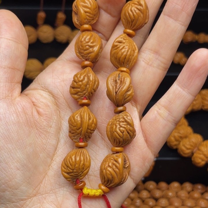 阜***龙吊坠桃核生命之源