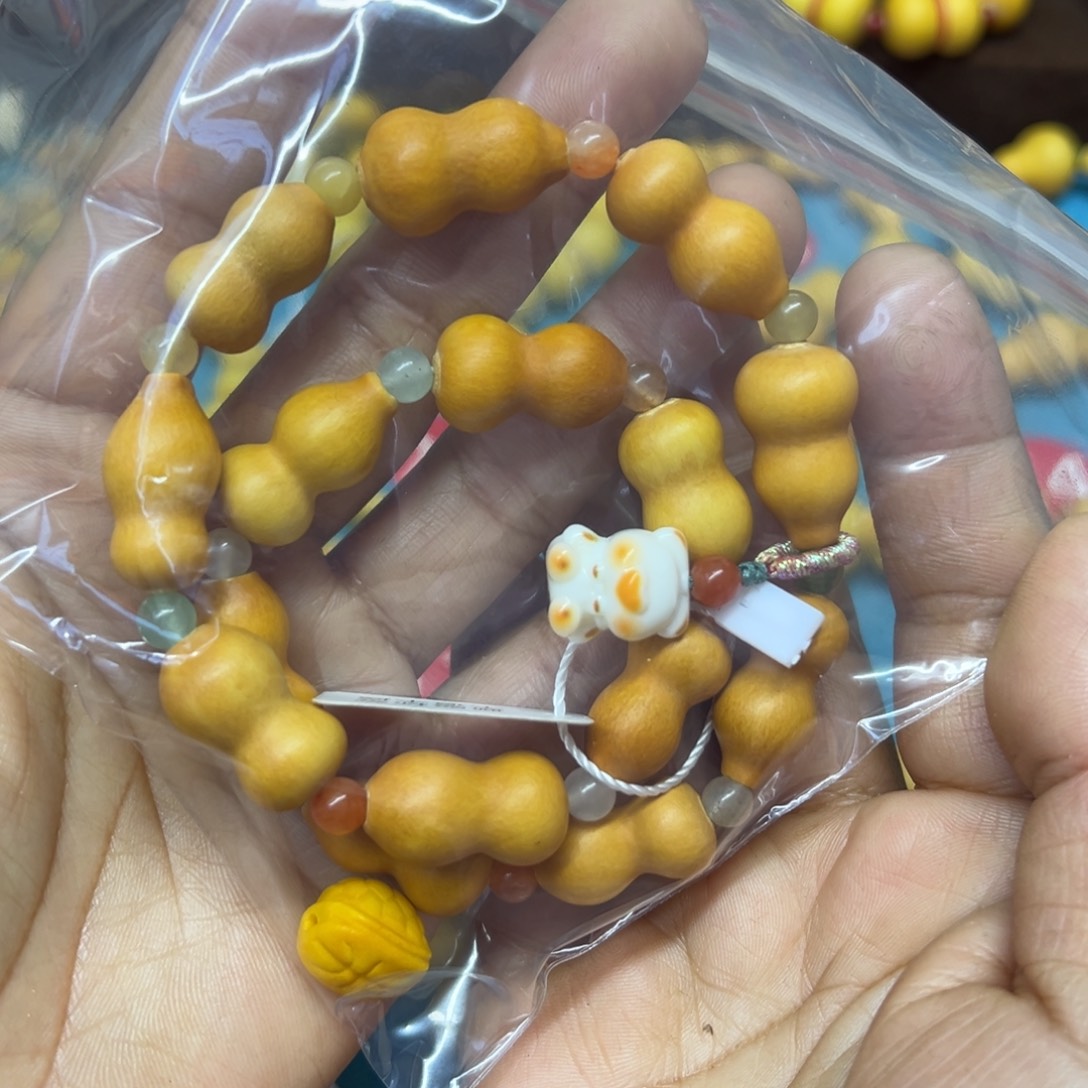 幸***王老皮葫芦草里金手串双圈