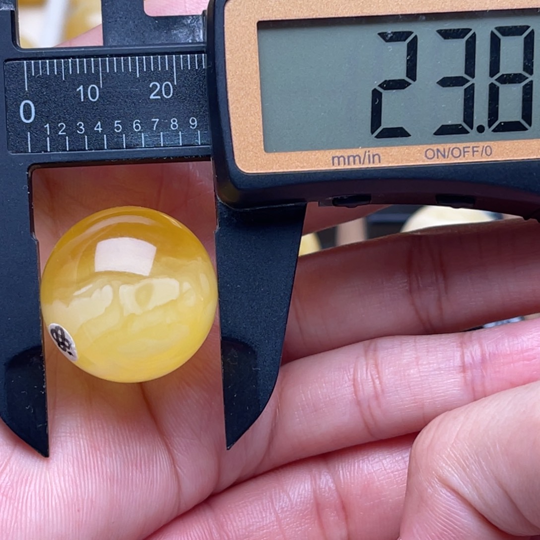 琥珀未镶嵌裸石蜜蜡圆珠笑