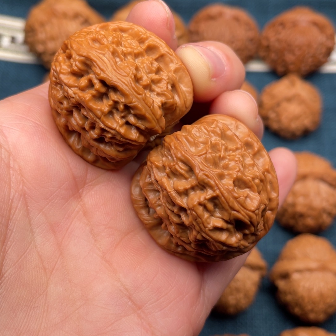 文玩核桃把件34全品红皮球白