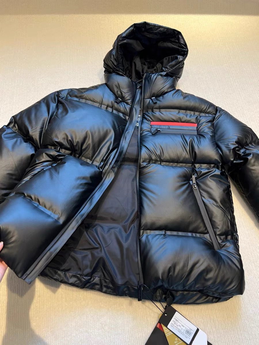 by深圳南油高端黑色羽绒服外套男女90鹅绒面包服潮