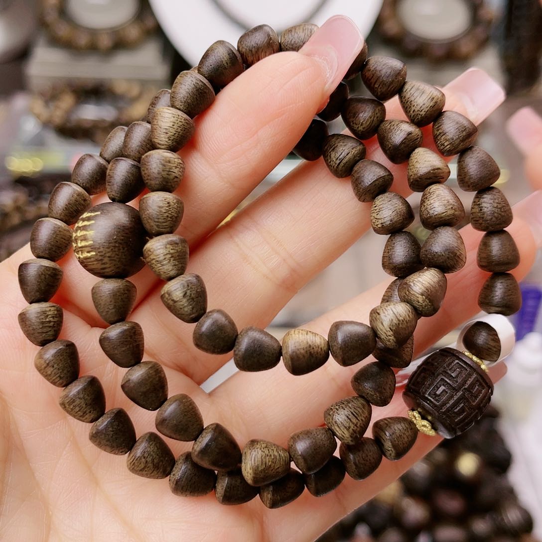 沉香手串紫棋顺化老料0.7水滴珠三圈款