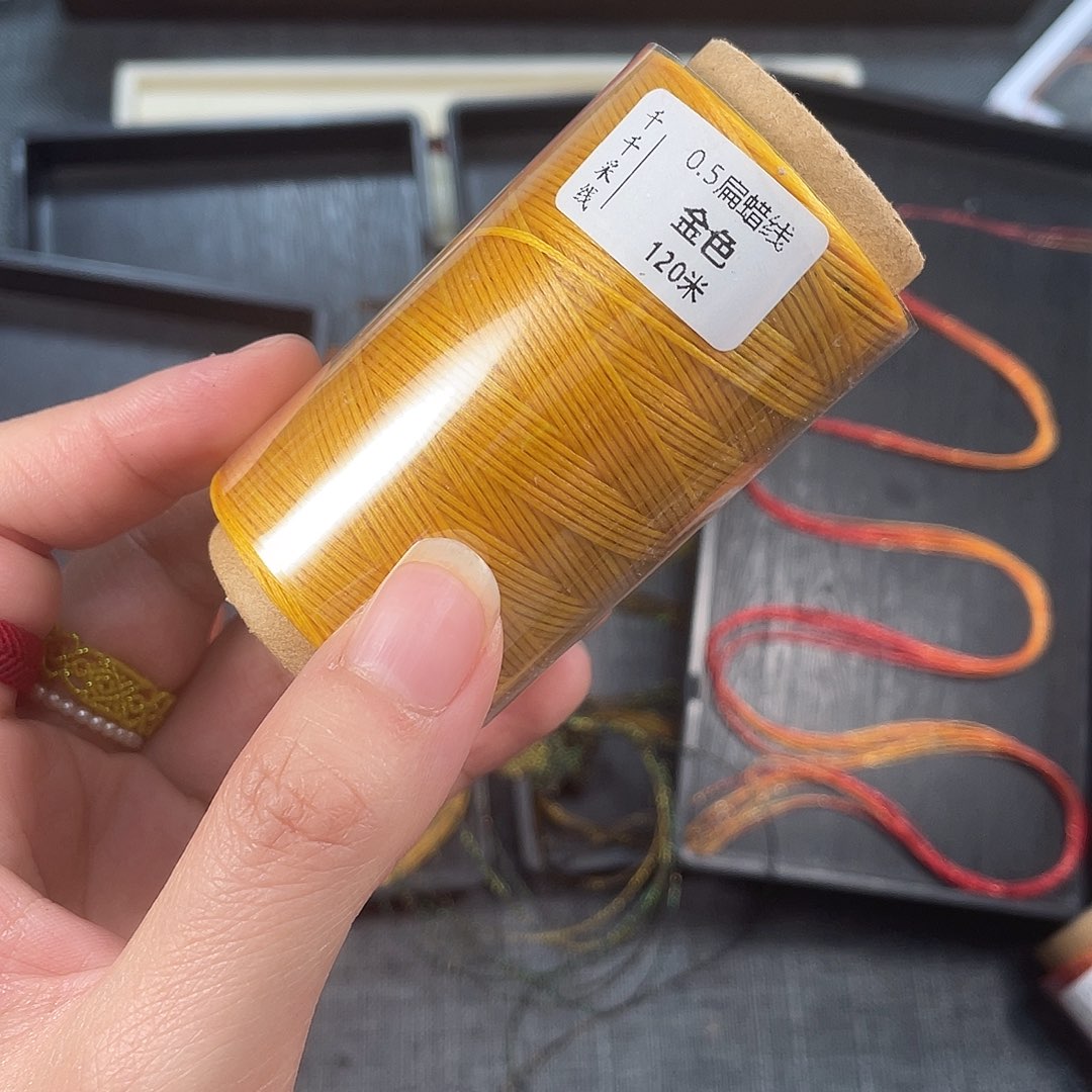 燕****聚酯纤维0.5扁蜡金色