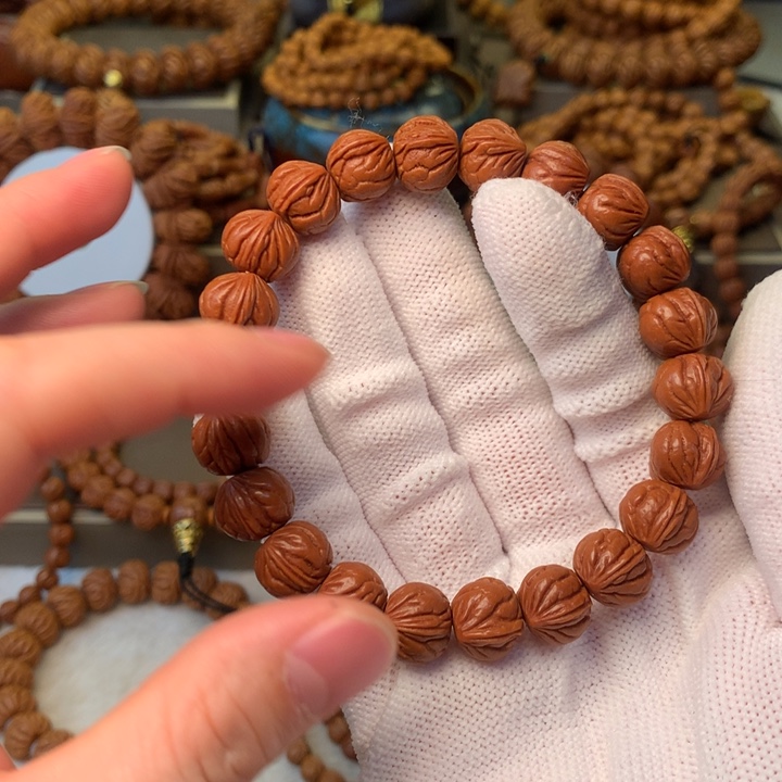 i***o桃核手串秦岭龙纹