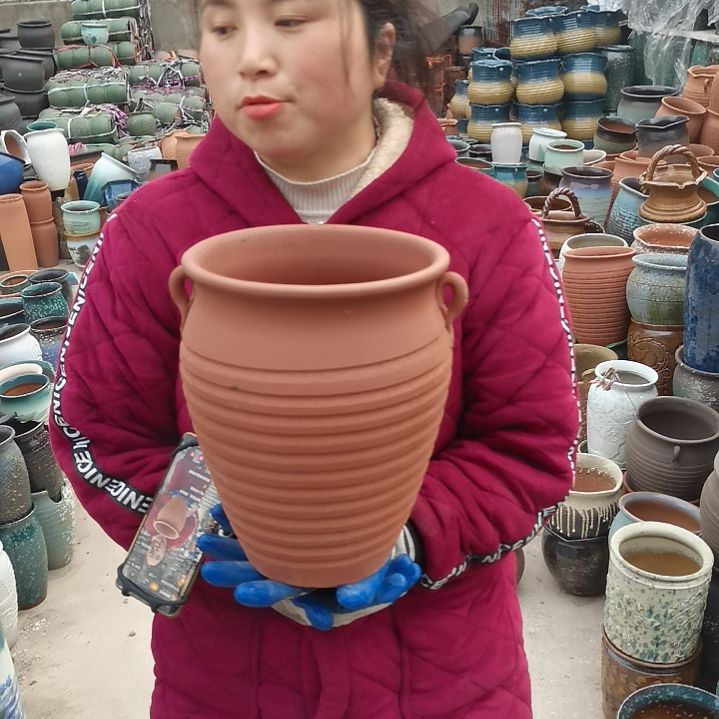 红陶口20高27瑕疵底部烧裂