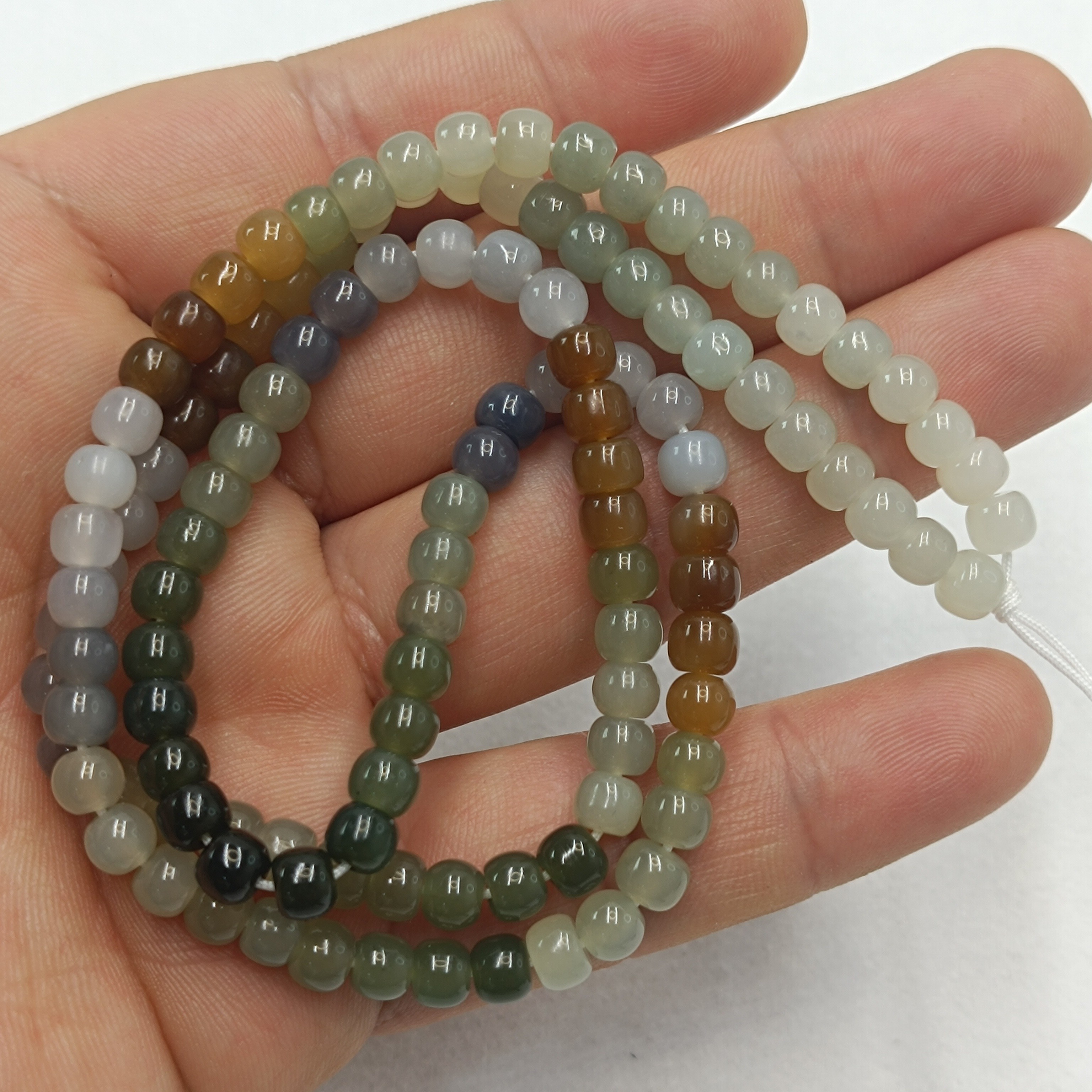 和田玉多宝药片手串6mm碧烟黄糖红