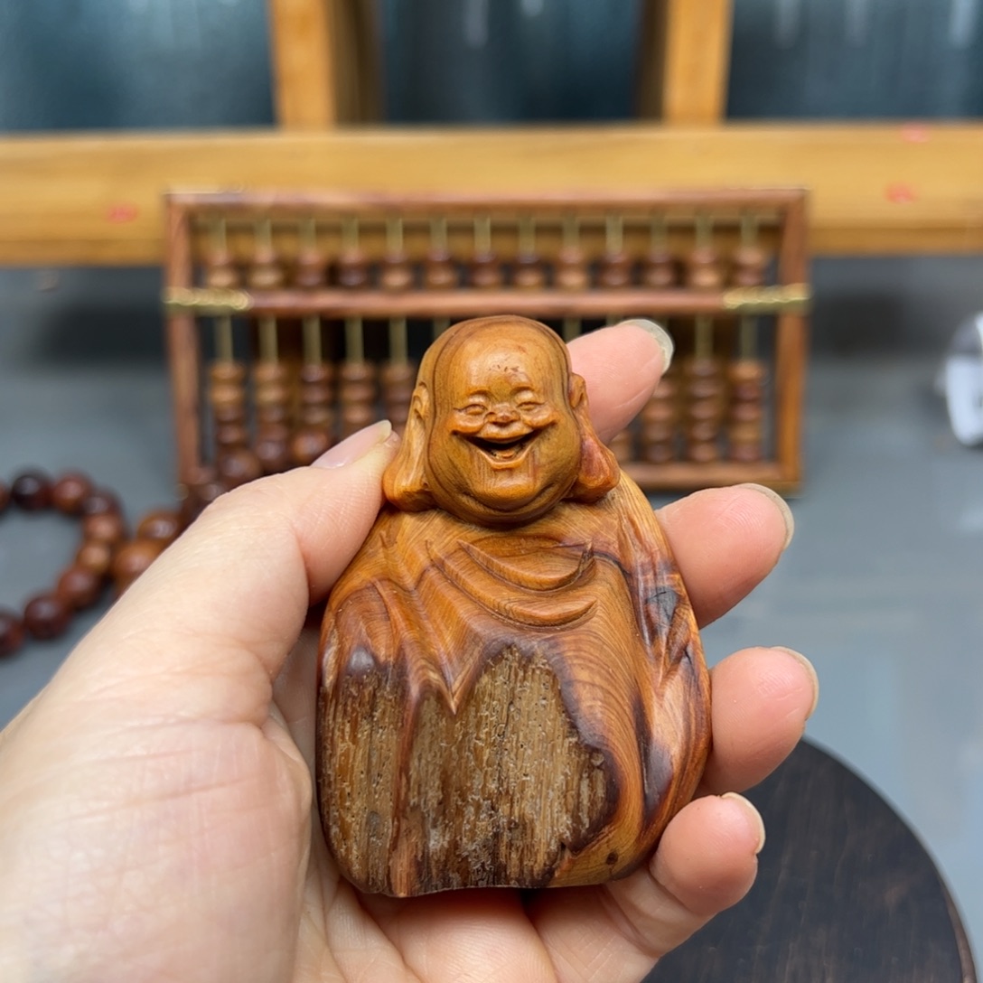 贝***y柏木崖柏木摆件手把件，