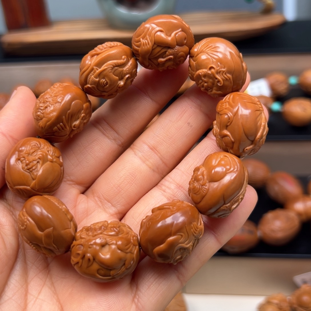 橄榄核吊坠无*罗汉手串