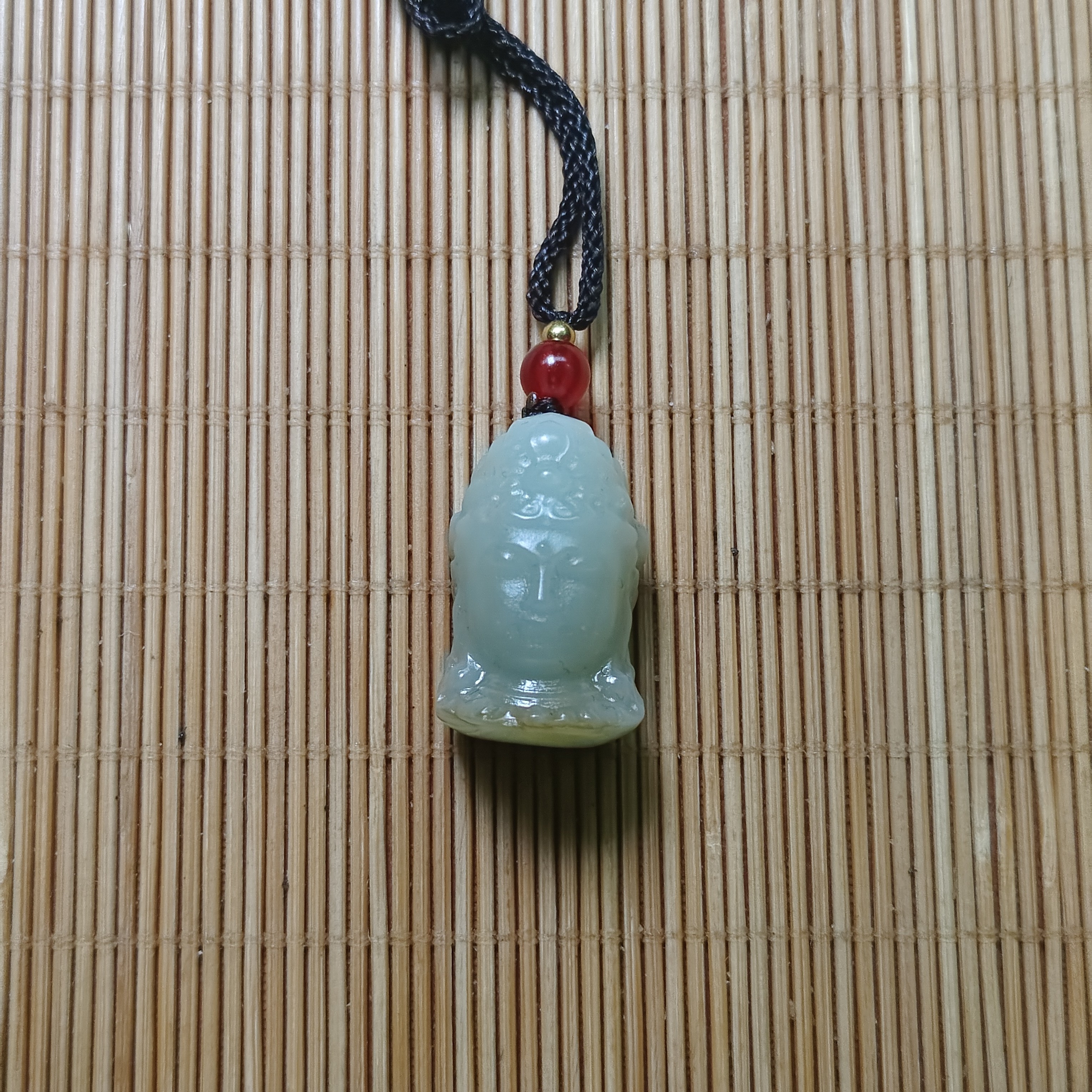 新疆和田玉佛头14克