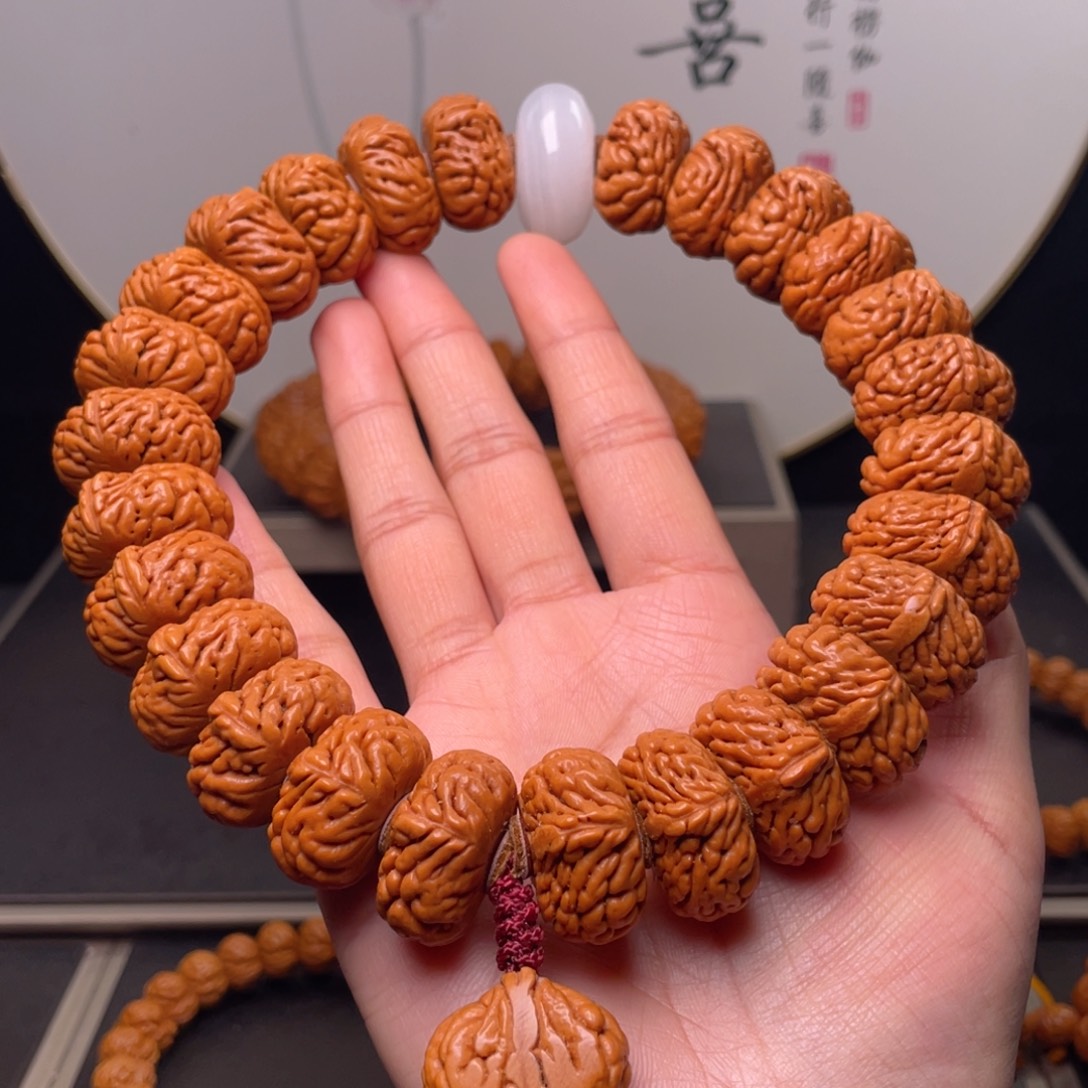 张***风吊坠桃核23尺寸麒麟手持