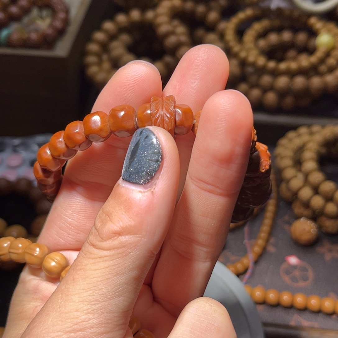 骨***明吊坠猴头核桃羽毛跑环