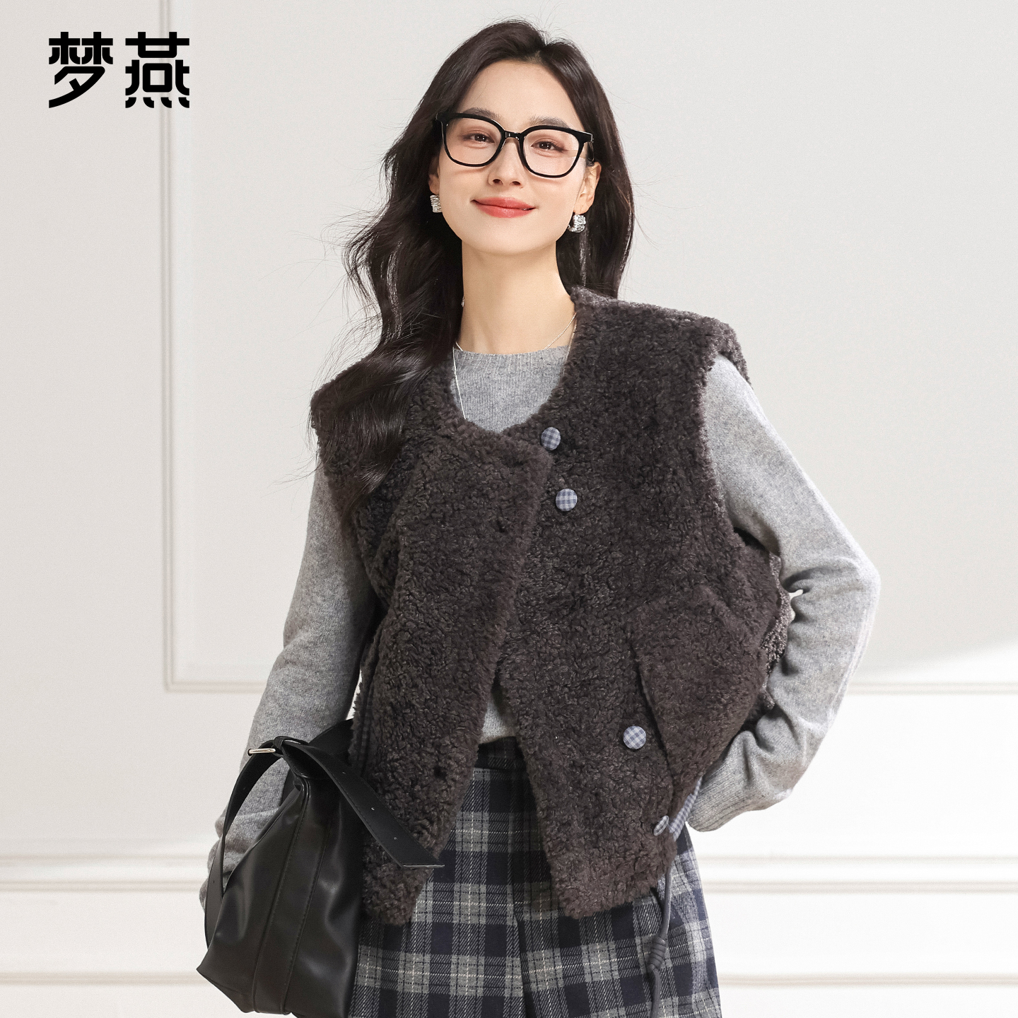 梦燕秋冬女时尚保暖简约大气宽松短款H版型圆领无袖马甲CM10B5009