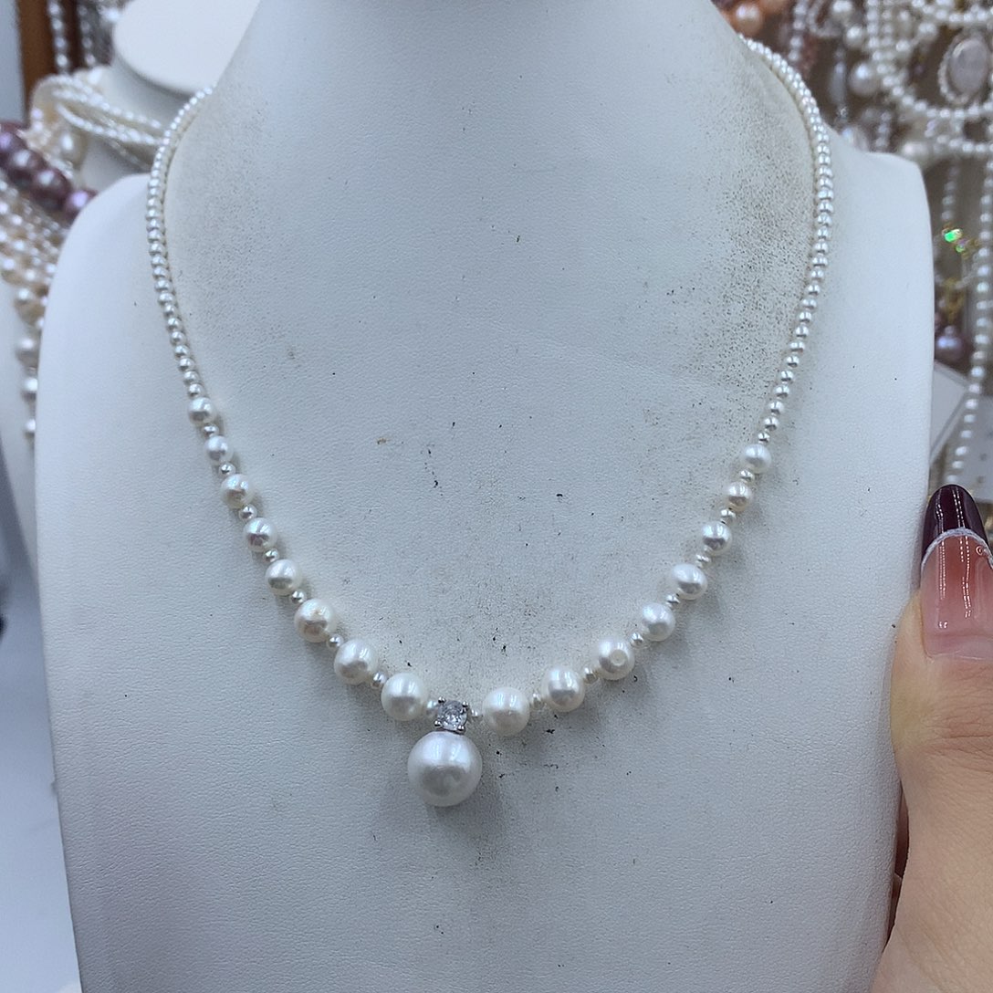 玉***欢耳饰银S925镶嵌淡水珍珠