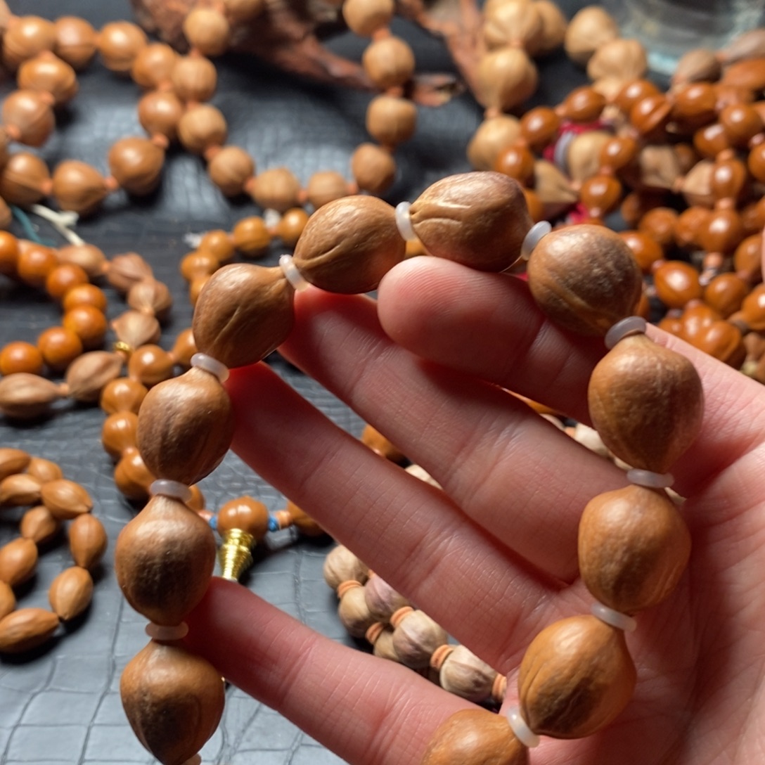 嘞***呦橄榄核吊坠好看了