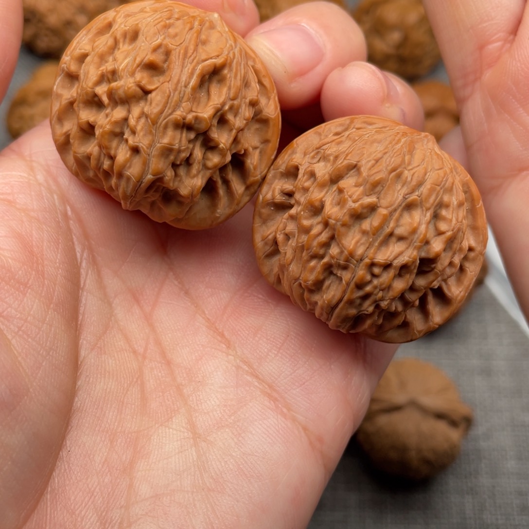 文玩核桃把件36红皮球磨