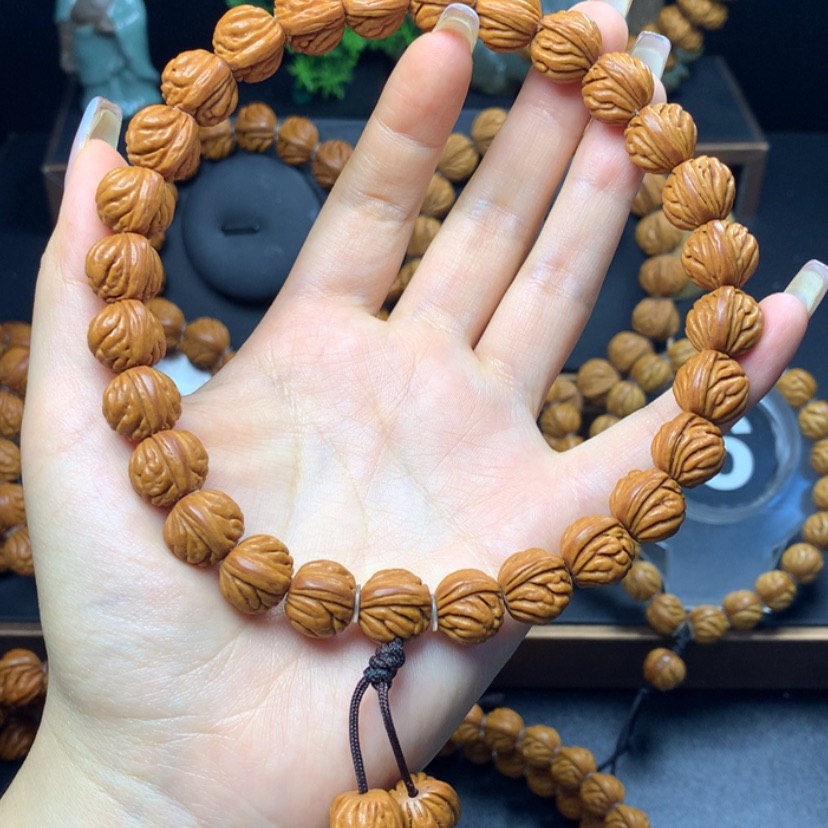 【闪购商品】桃核手串L***?火麒麟13手持