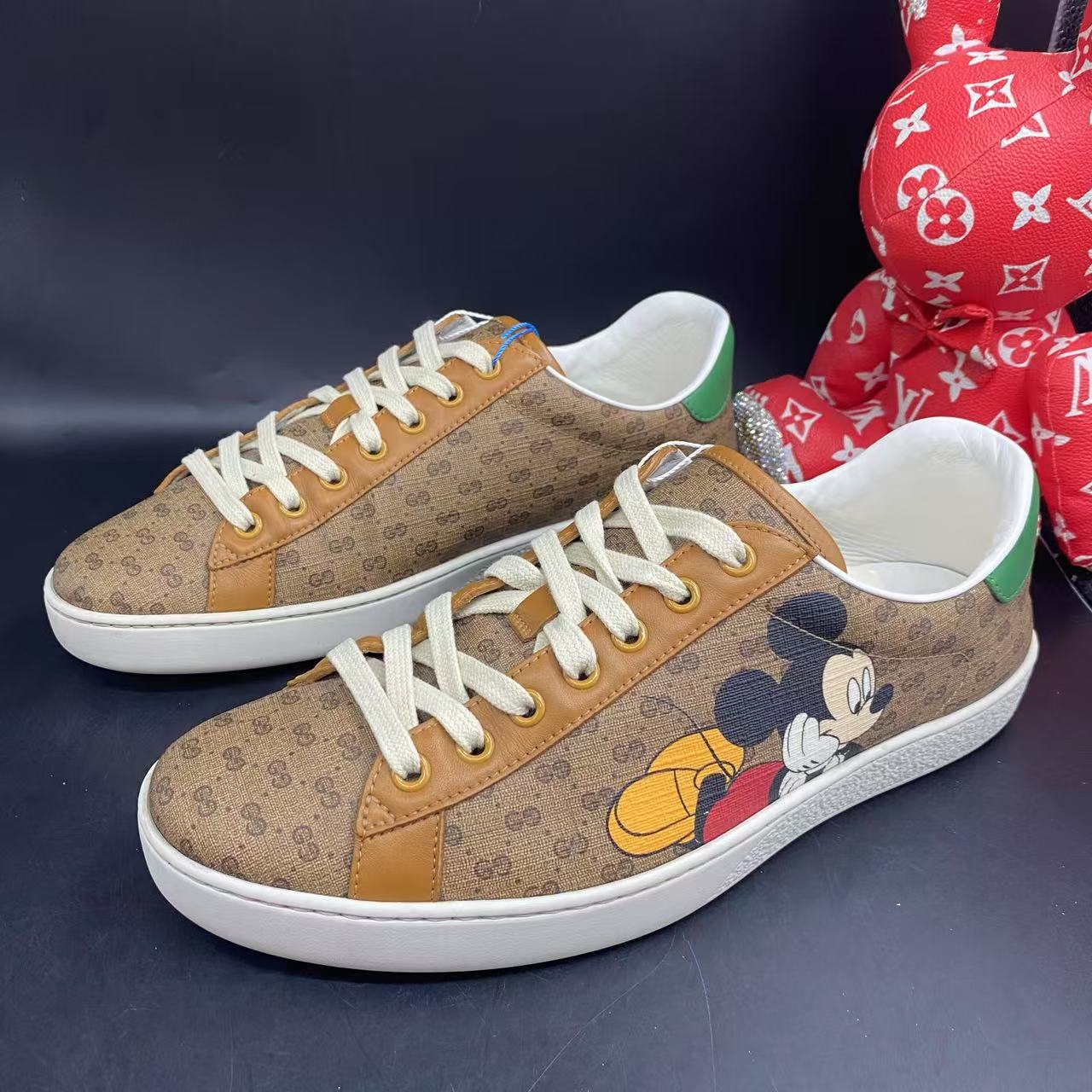 95新 GUCCI/古驰 棕老花米老鼠时尚舒适板鞋38.5欧码 ddm2438