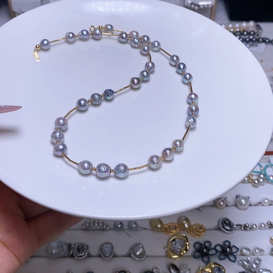 海水珍珠颈饰18K金镶嵌丹***力