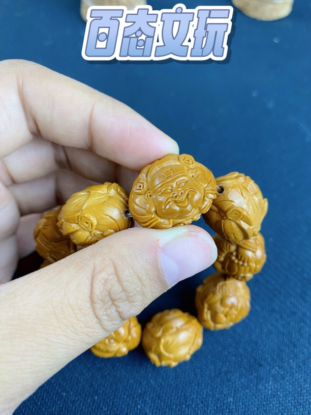 橄榄核雕刻财神手串尺寸2.0左右做工如图实物拍摄到手一样横版