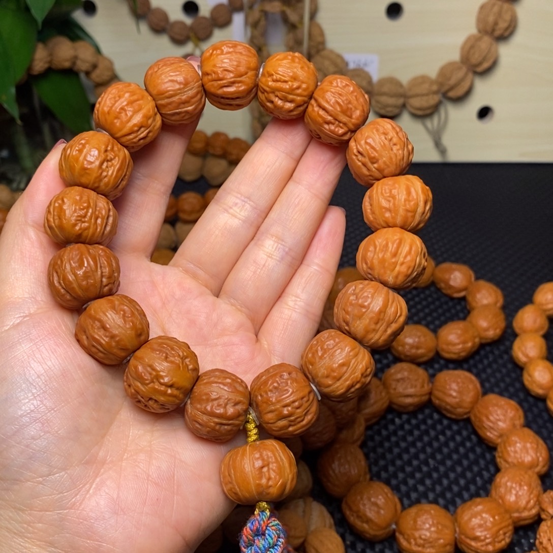 愤***鸟文玩核桃手串翻天印