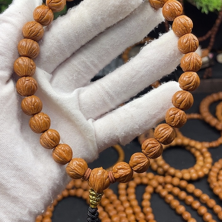 赵***大桃核吊坠秦岭龙纹桃核