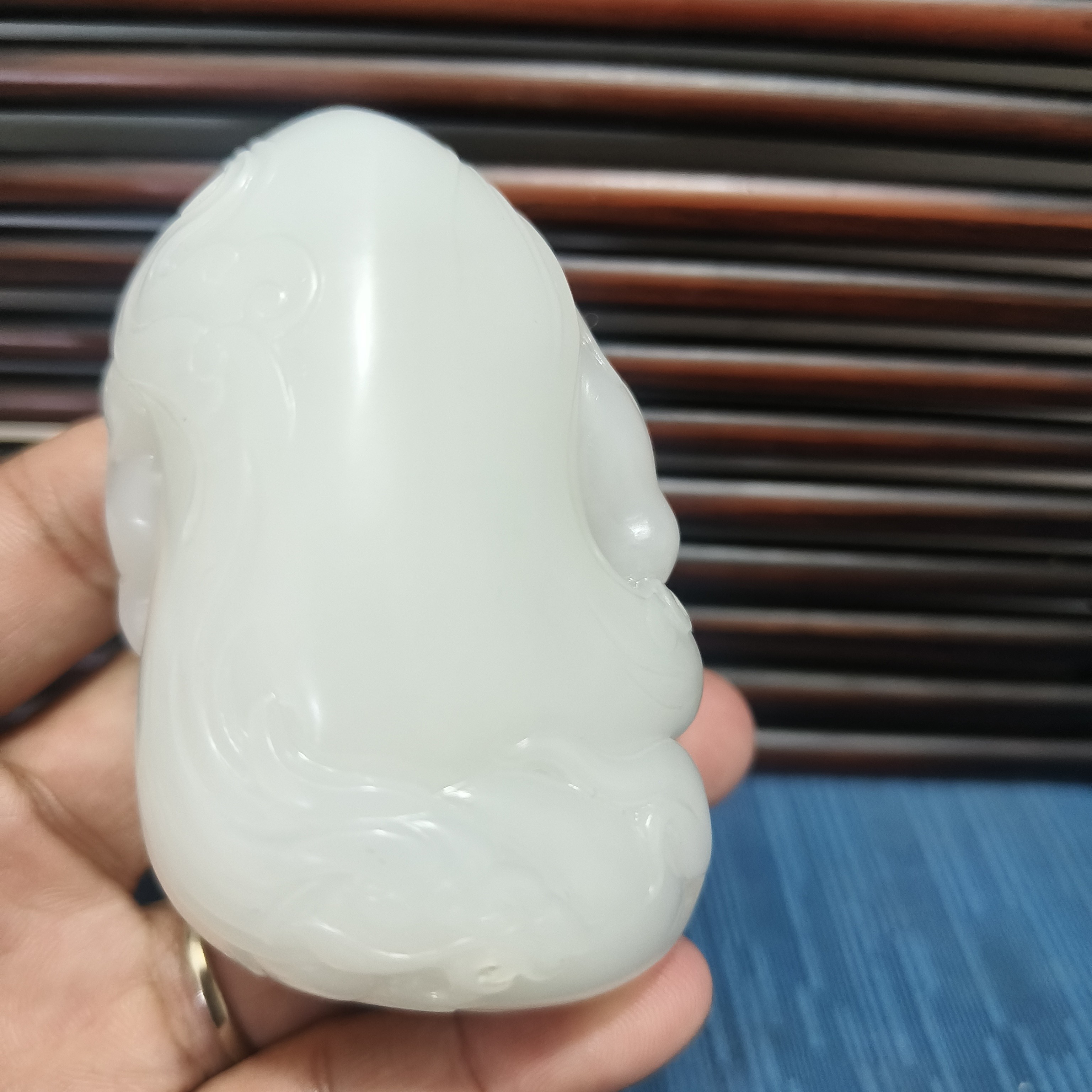 和田白玉手把件，魁星点斗寓意高中事业有成。