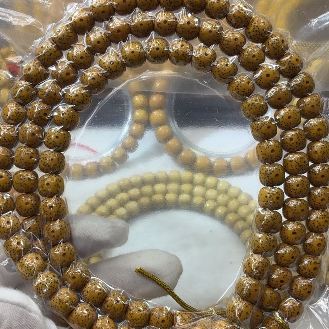 星月菩提吊坠10x9鸡油黄108