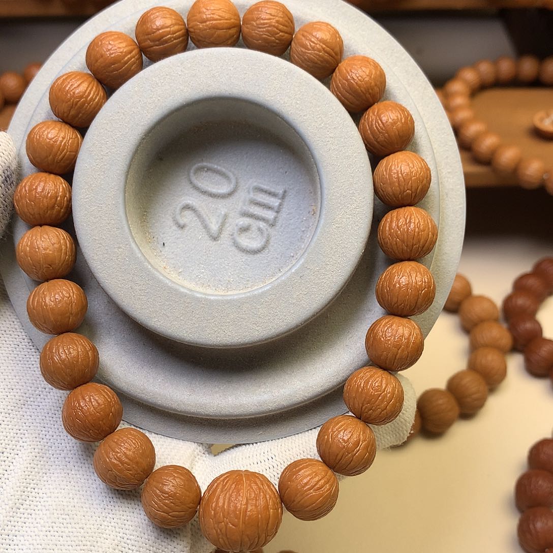 猴头核桃吊坠12全品凤羽手持