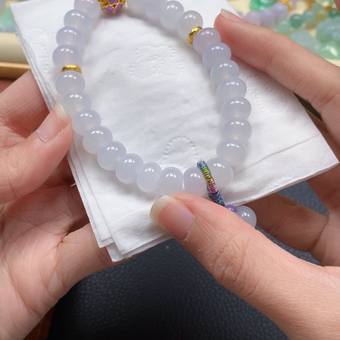 陈****翡翠未镶嵌颈饰是