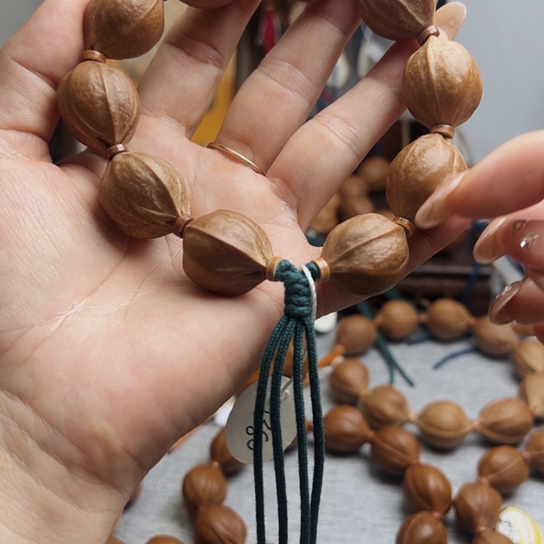 吴***饼橄榄核手串梅林铁核2125