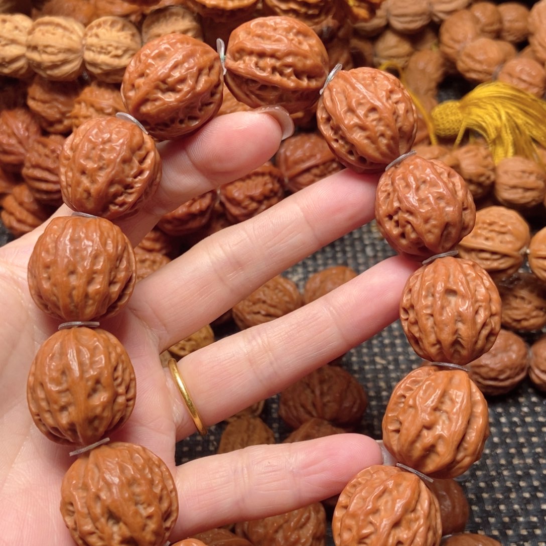 橙***警吊坠文玩核桃西瓜纹手串