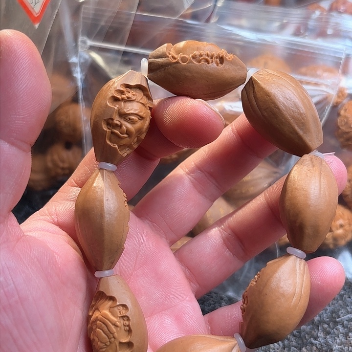 橄榄核吊坠一念之间