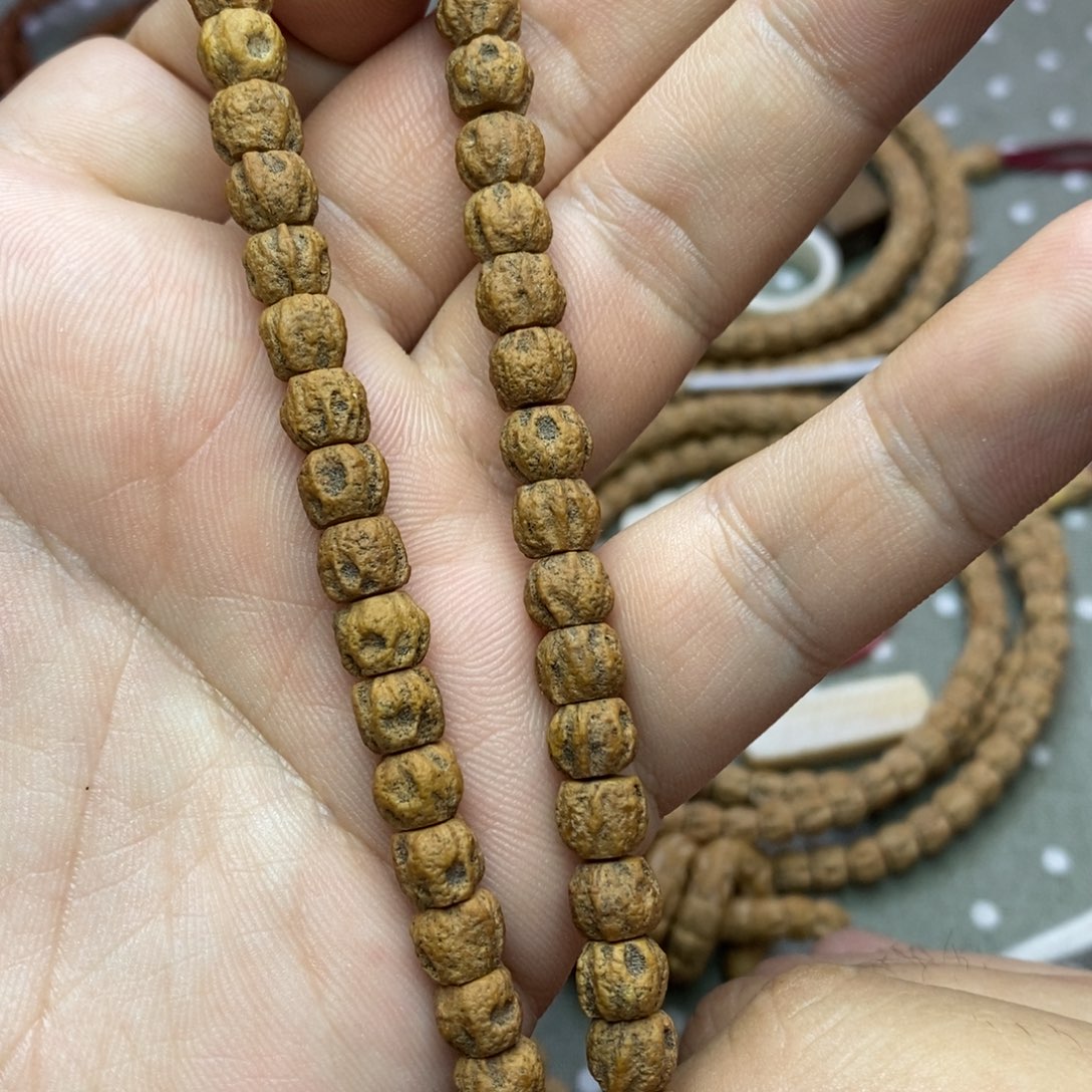 柏香籽/百香籽吊坠热振红油皮红芽口鬼脸手持7+