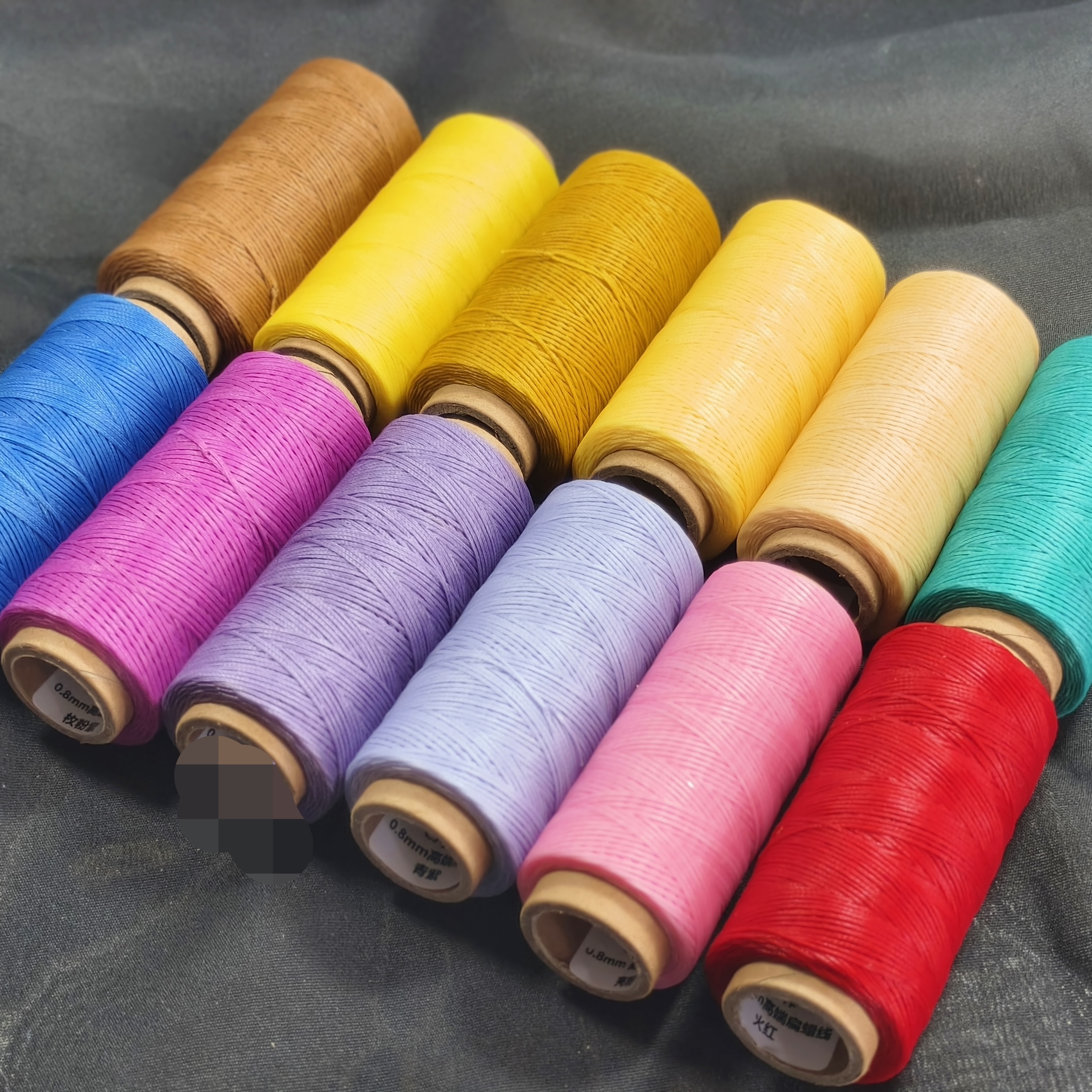 0.8扁蜡手工编绳金刚结包石线材每卷大约110米