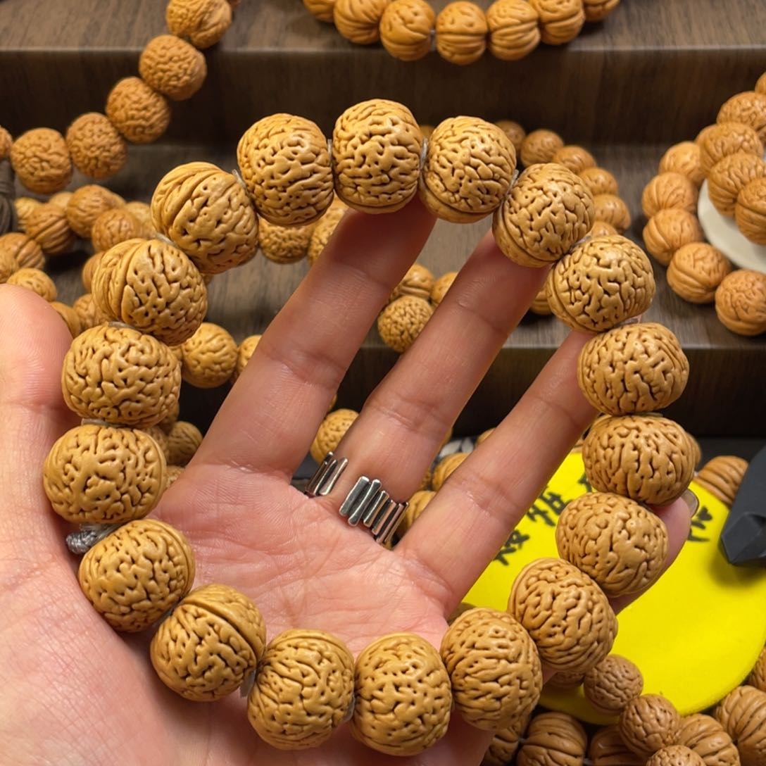 桃核手串三*面宽脐磨盘