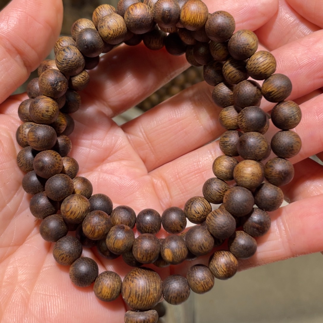 逍***燚手串沉香07多圈乌身圆叶