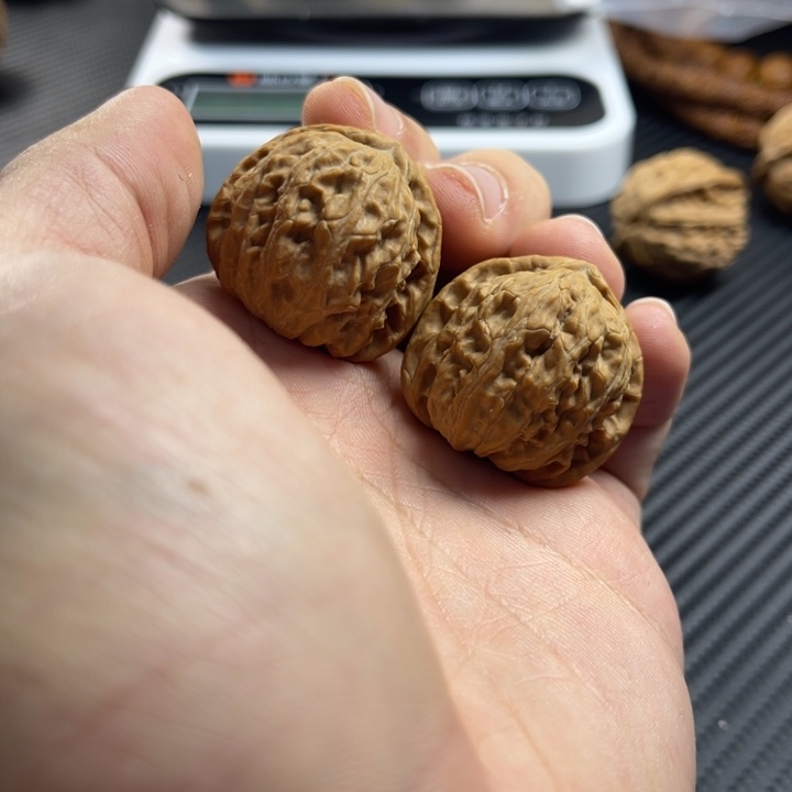 沐***家文玩核桃把件32小白