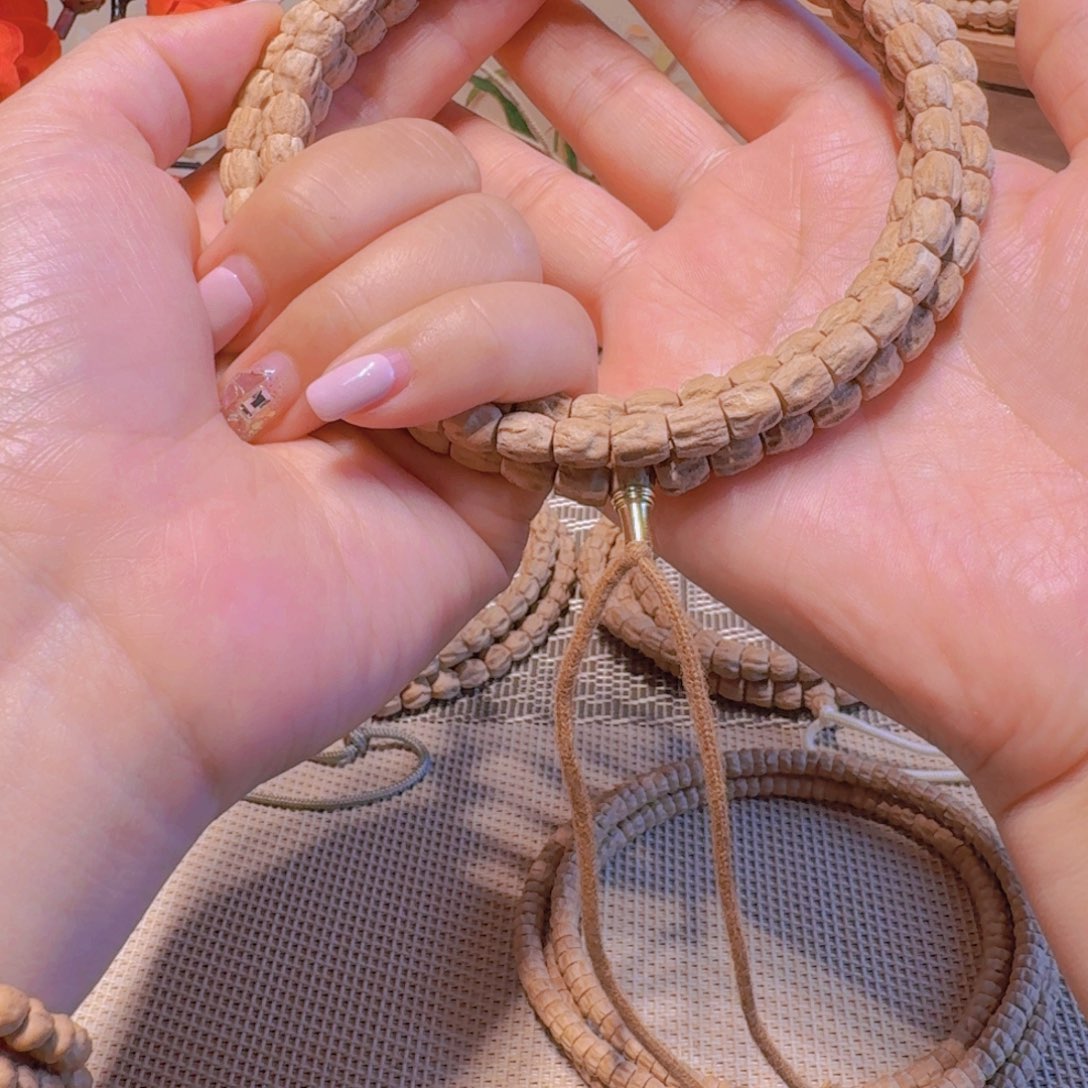 刘***斩柏香籽/百香籽吊坠