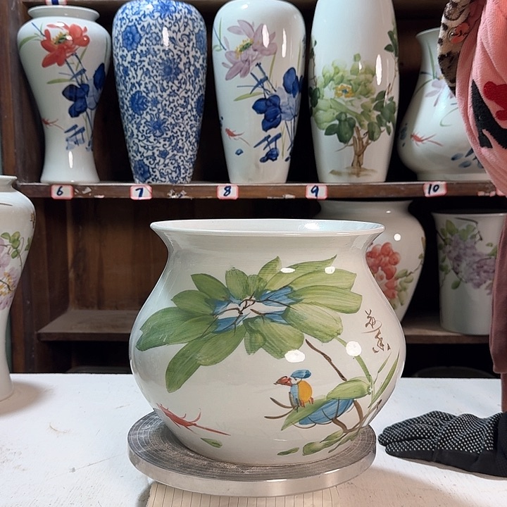 瓶钱袋子荷花鸟陶瓷