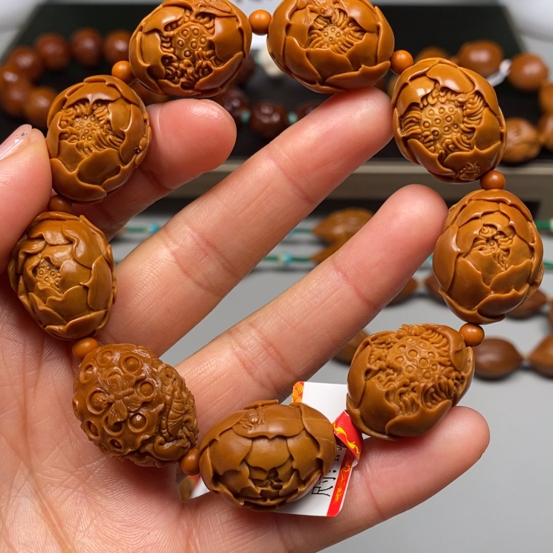橄榄核吊坠玉兰花