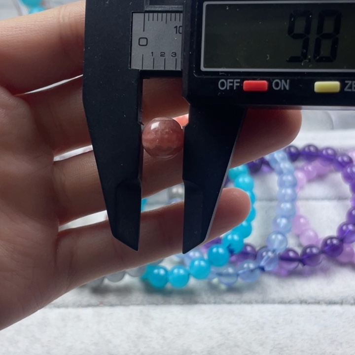 菱锰矿（红纹石）天然原矿红纹石圆珠10mm单颗未镶嵌五花肉