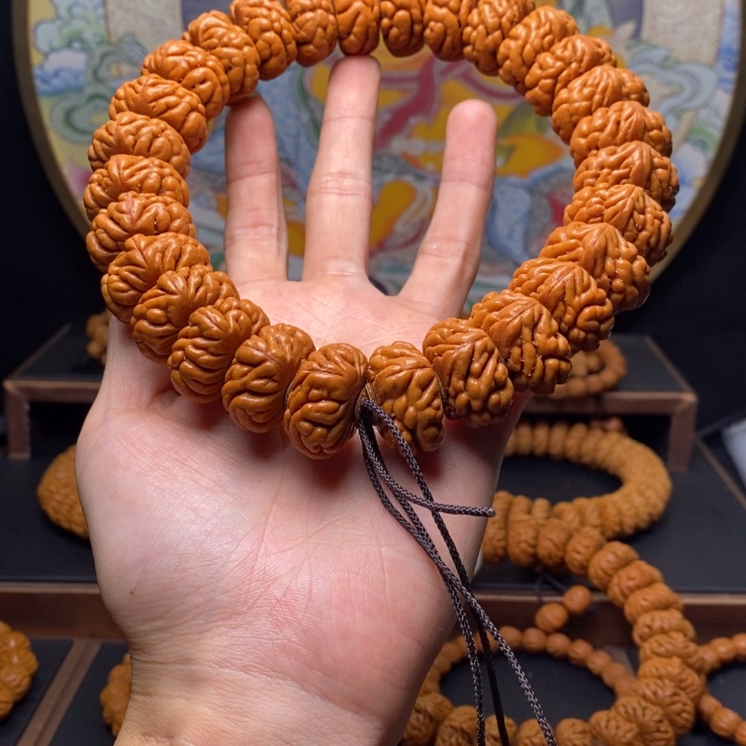 手串桃核奋****哥龙纹桃核豹子头