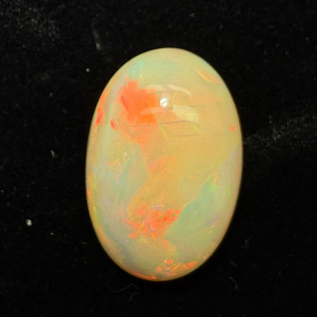 14.03ct天然彩欧泊裸石，尺寸23.1*15.5*8.6mm，颜色美艳，油画般色