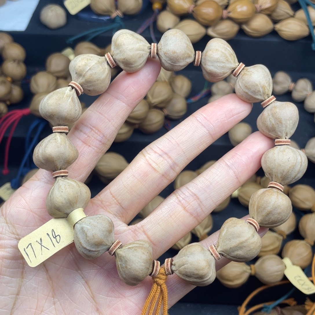 糯***.004橄榄核三花蒜头17*18