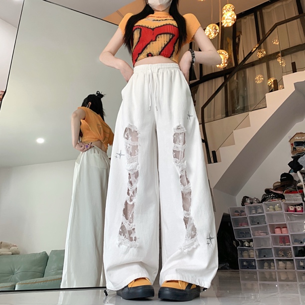 新款破洞拼接蕾丝弯刀牛仔跳舞长裤女夏季潮流款式［尺码拍小］